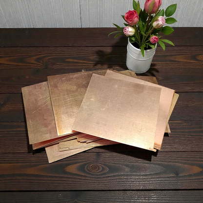 Set of 11 Copper Square Pieces (Copper Patra) used for Vastu correction, spiritual rituals, and energy enhancement
