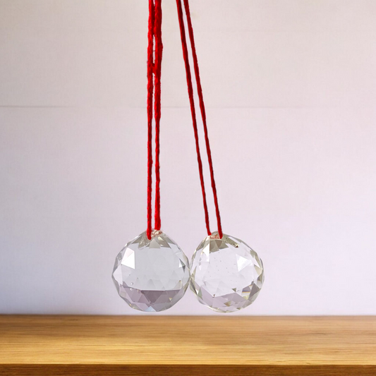 Set of 2 Crystal Balls for hanging, made of high-quality crystals, used for spiritual rituals, Vastu remedies, and home décor to enhance energy flow and attract positive vibrations