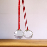Set of 2 Crystal Balls for hanging, made of high-quality crystals, used for spiritual rituals, Vastu remedies, and home décor to enhance energy flow and attract positive vibrations