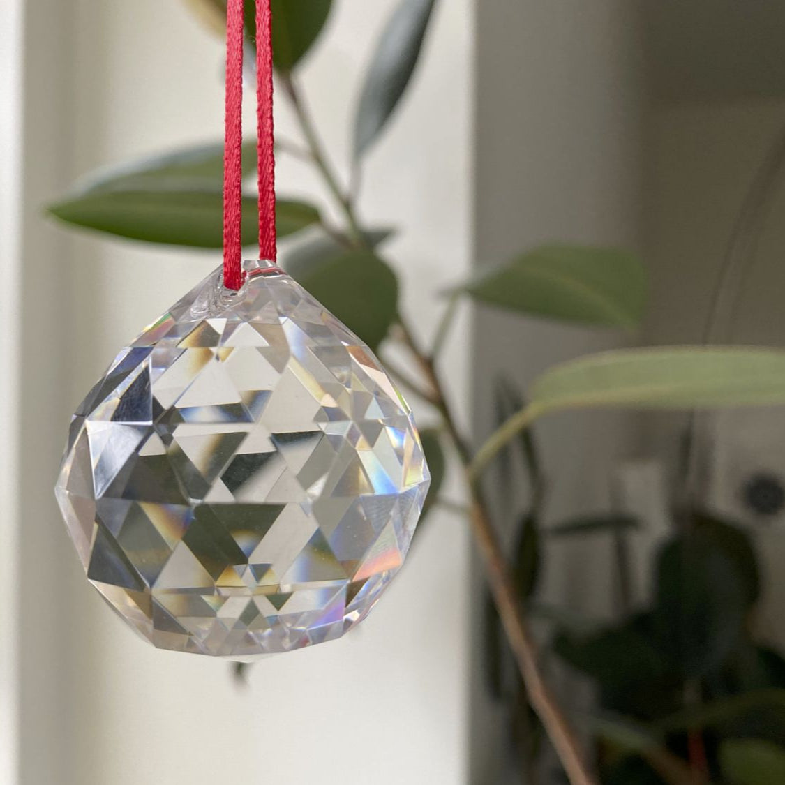 Set of 2 Crystal Balls for hanging, made of high-quality crystals, used for spiritual rituals, Vastu remedies, and home décor to enhance energy flow and attract positive vibrations.