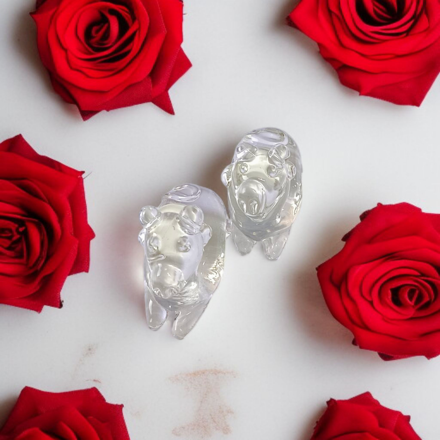 Set of 2 Sphatik Nandi idols, made from Sphatik crystal (Crystal Quartz), used for spiritual practices, Vastu remedies, and enhancing positive energy