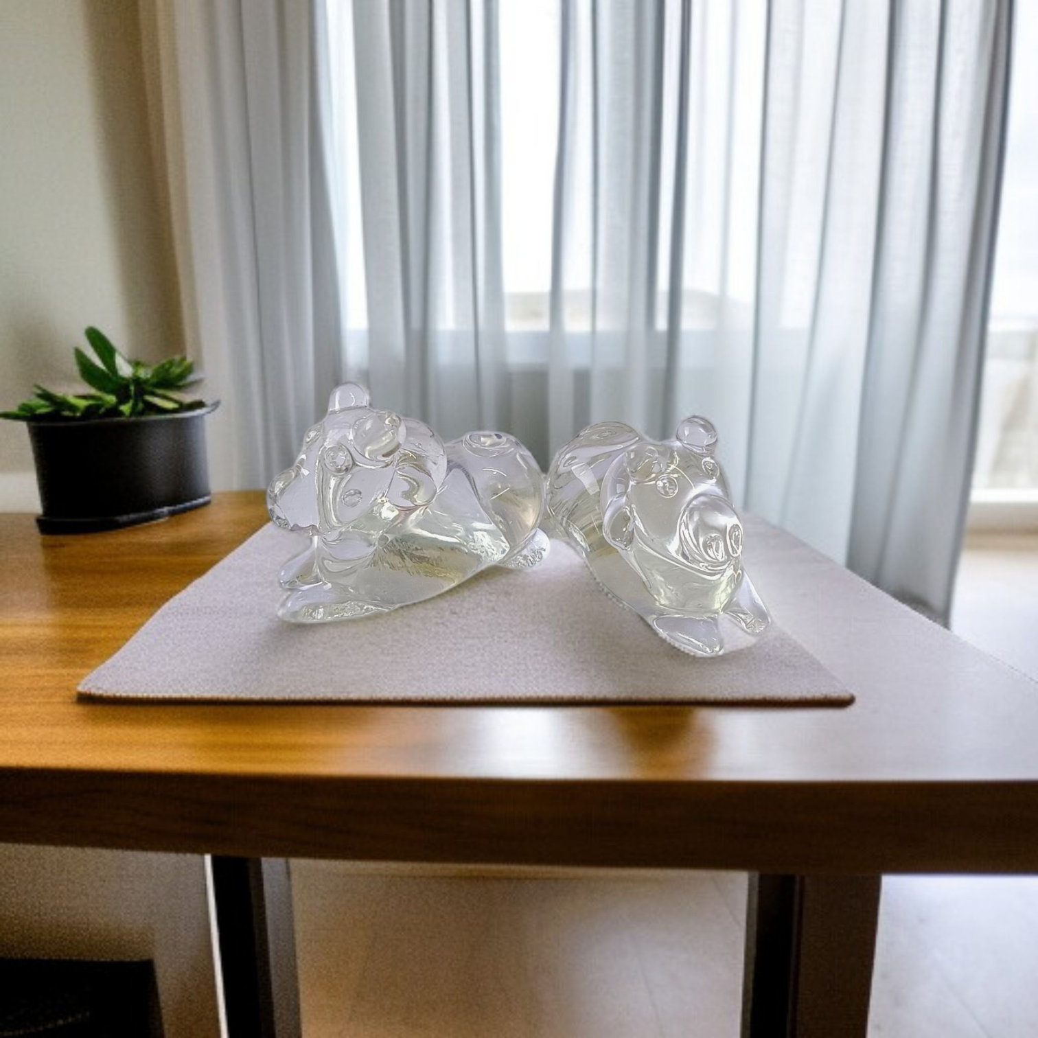 Set of 2 Sphatik Nandi idols, made from Sphatik crystal (Crystal Quartz), used for spiritual practices, Vastu remedies, and enhancing positive energy