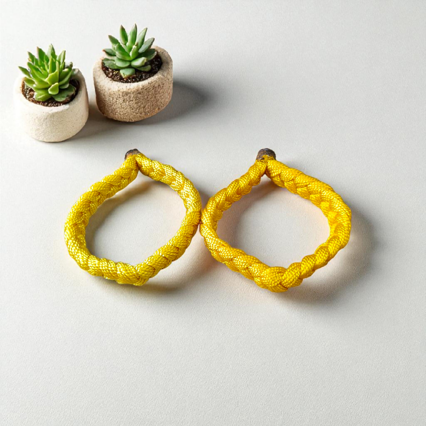 Set of 2 handmade yellow Raksha Sutra thread bracelets for men and women – adjustable spiritual Kalawa for protection