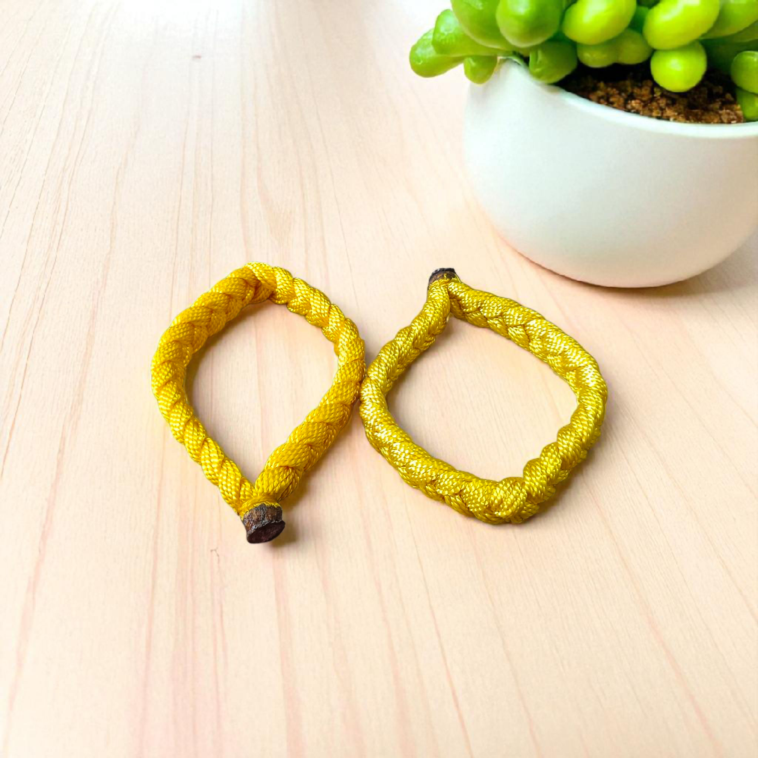 Set of 2 handmade yellow Raksha Sutra thread bracelets for men and women – adjustable spiritual Kalawa for protection