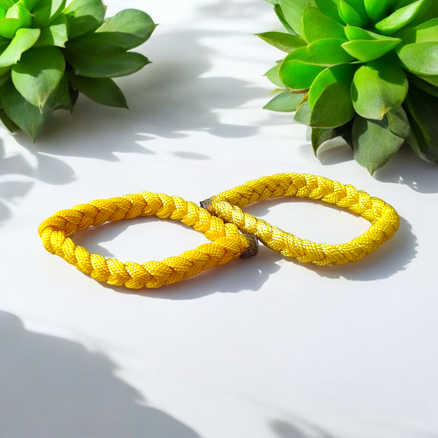 Set of 2 handmade yellow Raksha Sutra thread bracelets for men and women – adjustable spiritual Kalawa for protection
