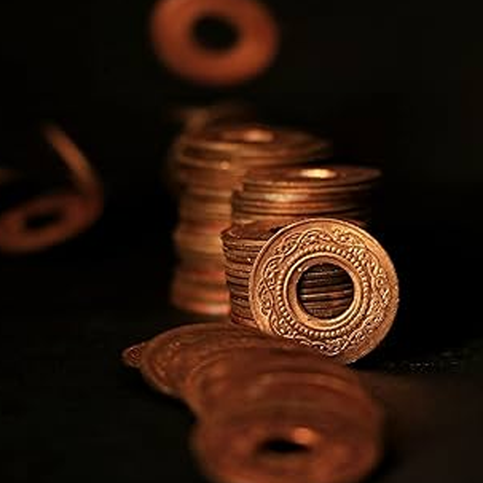 Set of 7 Copper Hole Coins, used in spiritual practices, poojas, and Tantric rituals for protection, prosperity, and positive energy flow.