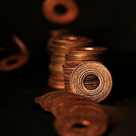 Set of 7 Copper Hole Coins, used in spiritual practices, poojas, and Tantric rituals for protection, prosperity, and positive energy flow.