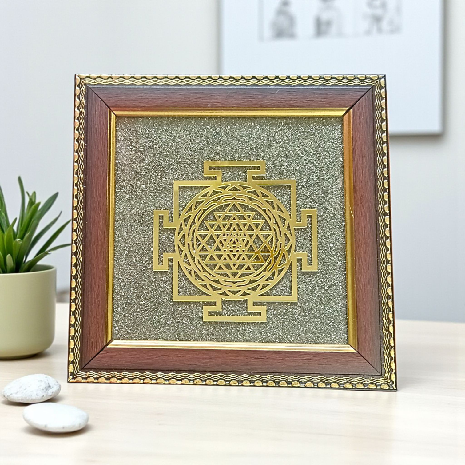 Shree Yantra mounted on raw Pyrite crystal in a wooden Vastu-compliant photo frame for spiritual home and office décor