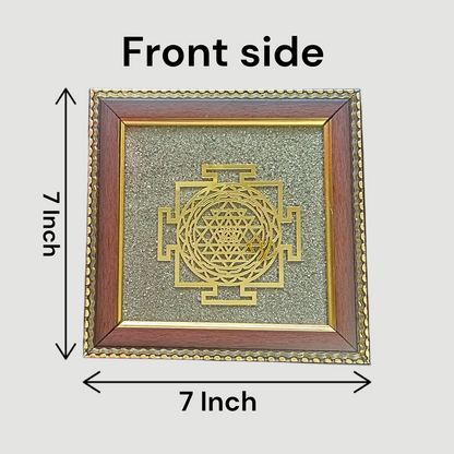 Shree Yantra mounted on raw Pyrite crystal in a wooden Vastu-compliant photo frame for spiritual home and office décor