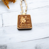 Shri Bageshwar Dham Tulsi Wood Locket with Tulsi Mala, symbolizing divine protection, spiritual connection