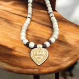 Shri Sita Ram Tulsi Locket In Tulsi Mala displayed with a close-up view of the sacred beads and the elegant locket featuring Lord Ram and Goddess Sita