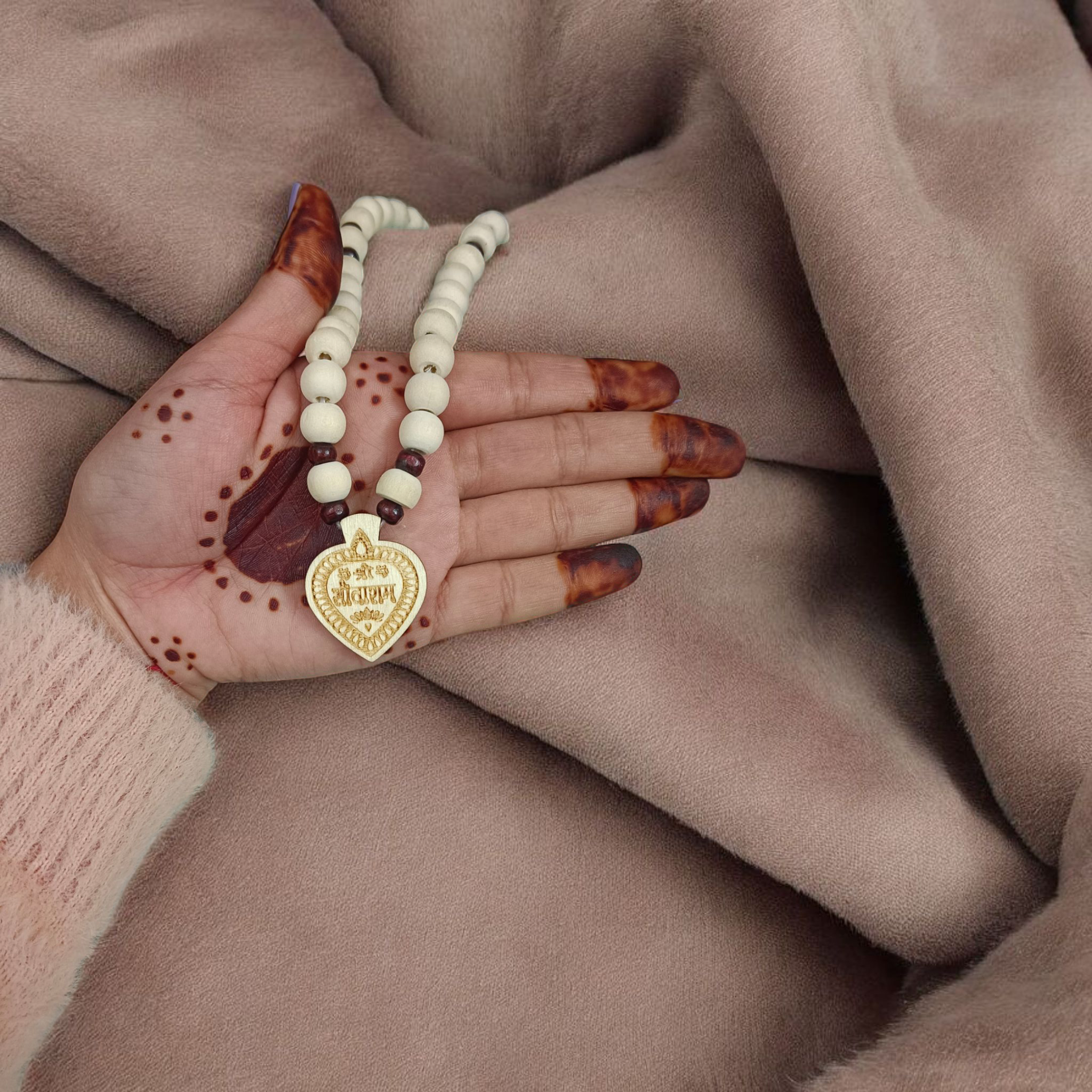 Shri Sita Ram Tulsi Locket In Tulsi Mala displayed with a close-up view of the sacred beads and the elegant locket featuring Lord Ram and Goddess Sita