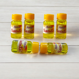 Small 4ML glass roll-on bottle of natural Sandal Attar (Chandan Itra) by Veena, perfect for spiritual rituals, meditation, and daily wear