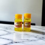 Small 4ML glass roll-on bottle of natural Sandal Attar (Chandan Itra) by Veena, perfect for spiritual rituals, meditation, and daily wear