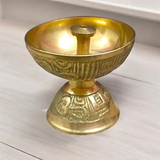 Small Brass Akhand Jyot diya with a steady flame, crafted from high-quality brass, perfect for pooja rituals and creating a peaceful spiritual environment.

