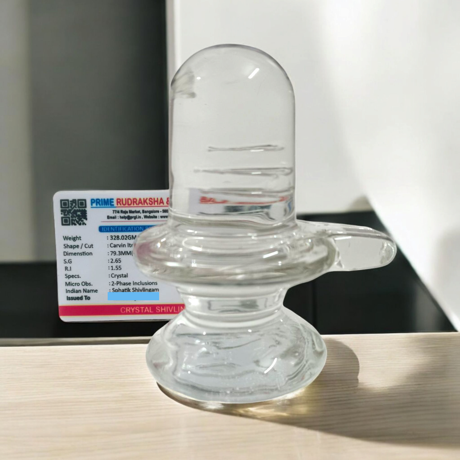 Sphatik Shivling crafted from Crystal Quartz, Lab Certified, symbolizing Lord Shiva, for spiritual growth, prosperity, and energy amplification.