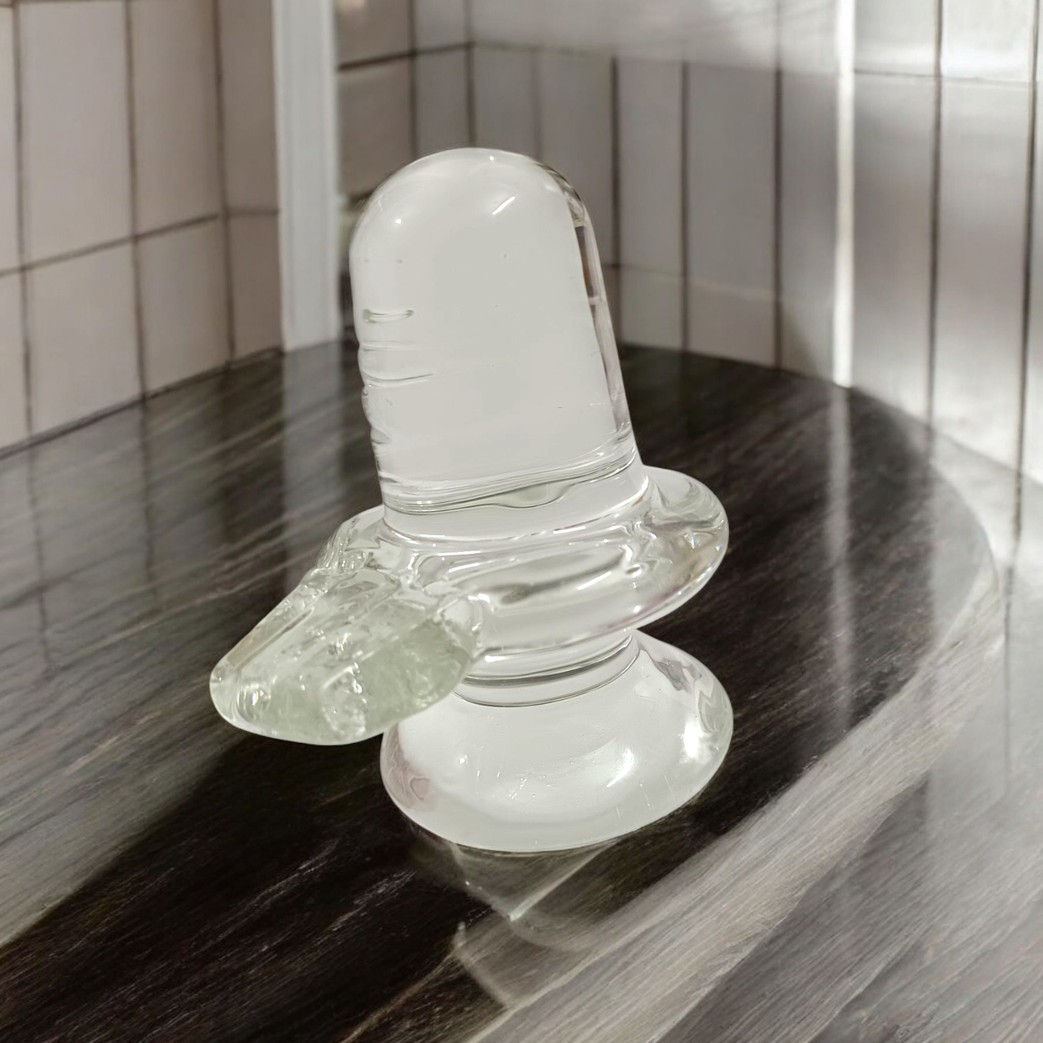 Sphatik Shivling crafted from Crystal Quartz, Lab Certified, symbolizing Lord Shiva, for spiritual growth, prosperity, and energy amplification.