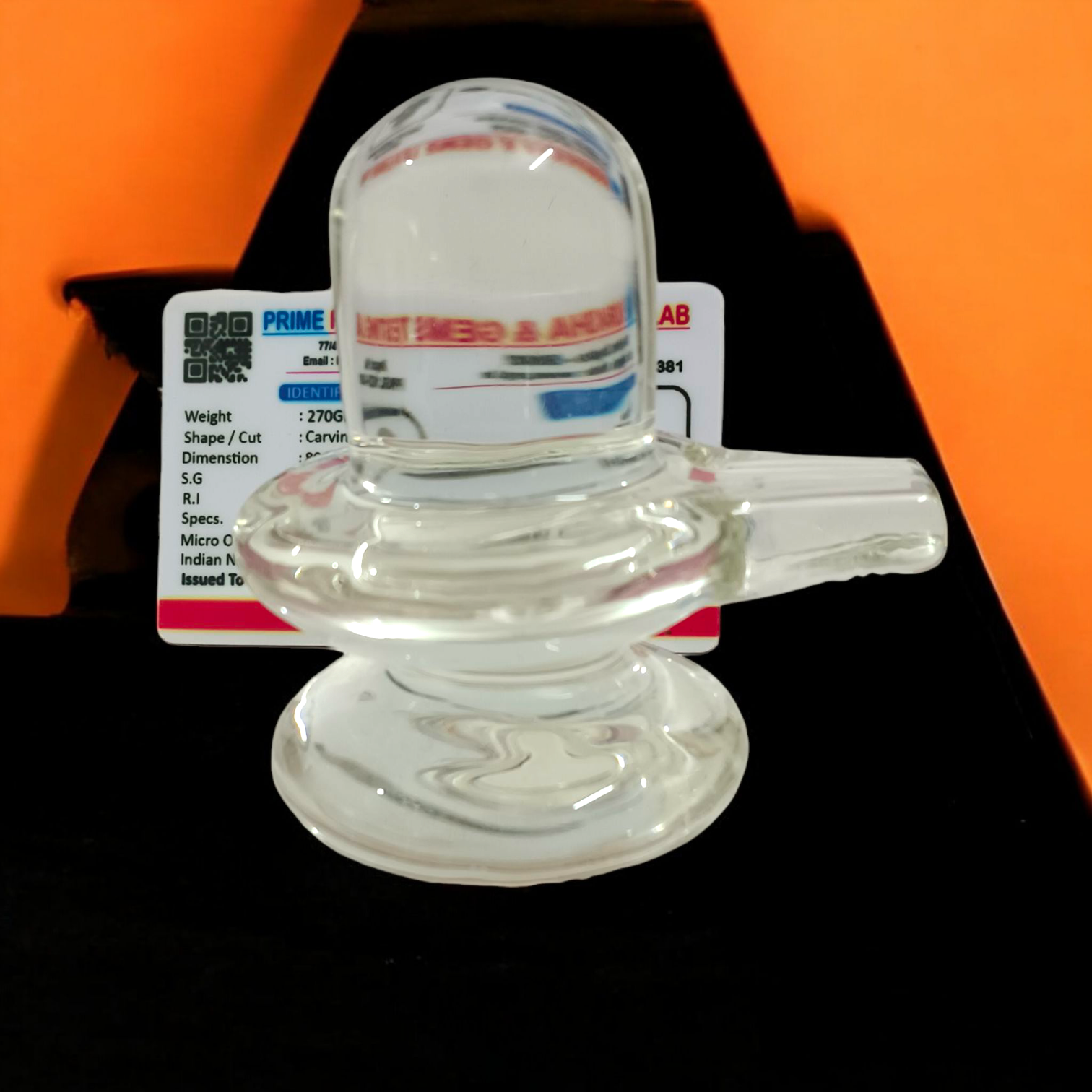 Sphatik Shivling crafted from Crystal Quartz, Lab Certified, symbolizing Lord Shiva, for spiritual growth, prosperity, and energy amplification.