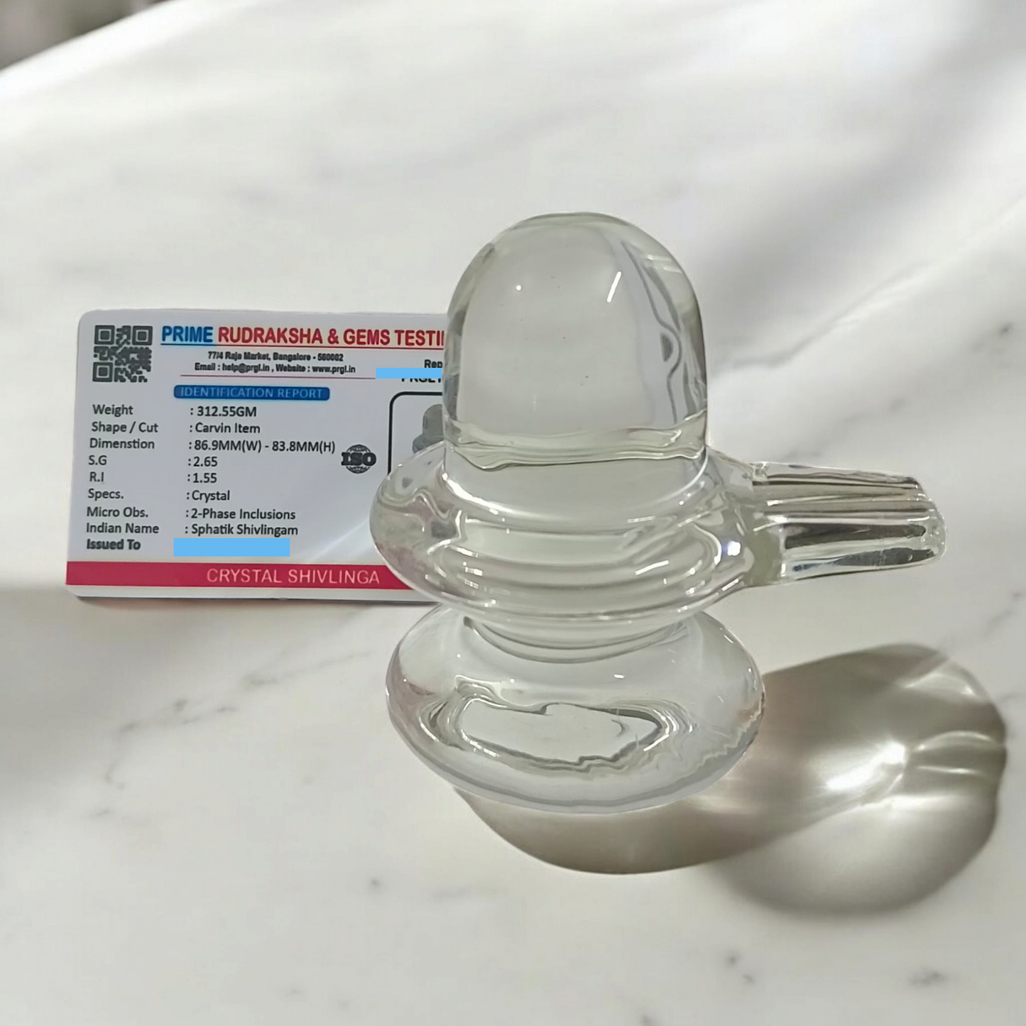 Sphatik Shivling crafted from Crystal Quartz, Lab Certified, symbolizing Lord Shiva, for spiritual growth, prosperity, and energy amplification.