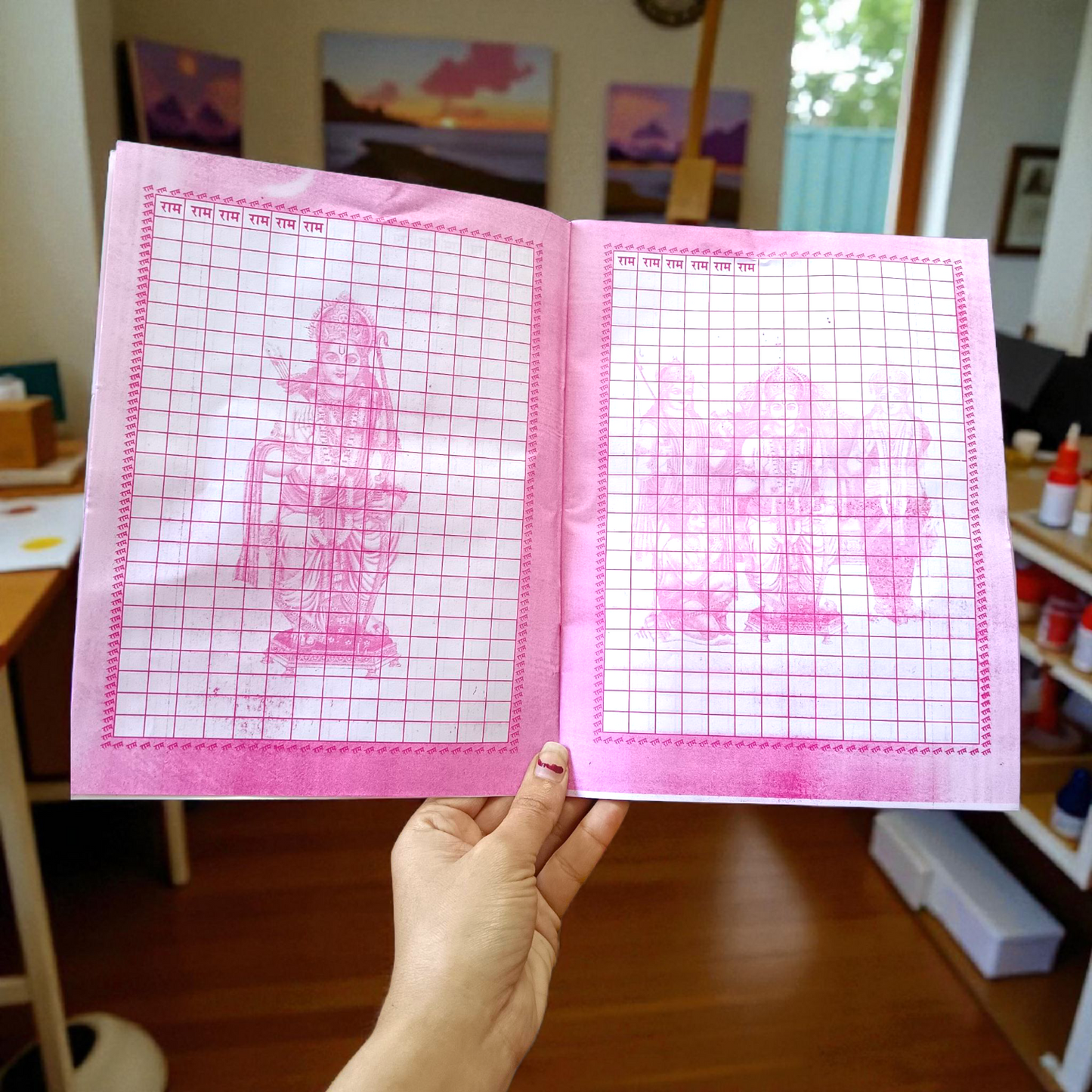 The Ram Naam Lekhan Book featuring sacred spaces to write the name of Shri Ram 25,000 times, symbolizing a deep spiritual connection with the divine
