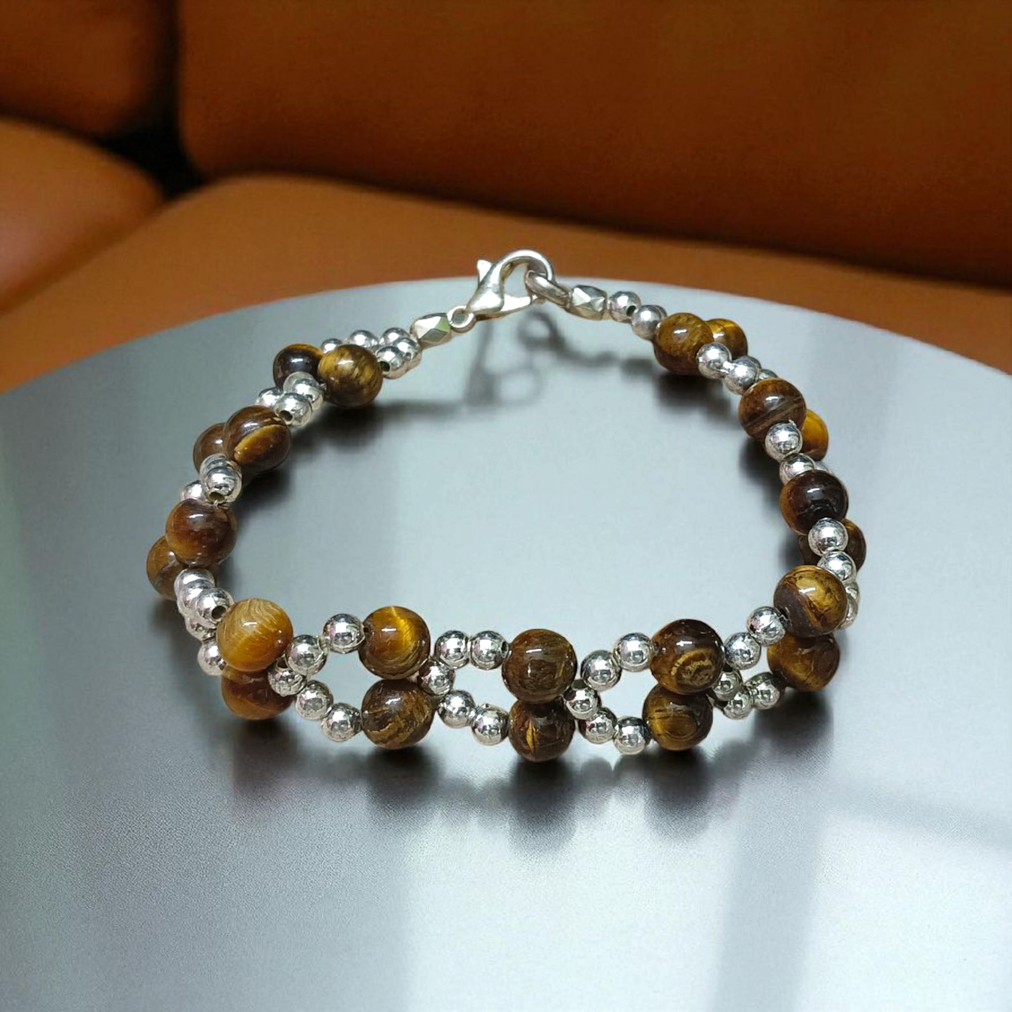 Tiger Eye Bracelet made of natural 7mm lab-certified beads with golden-brown tones placed on a white background