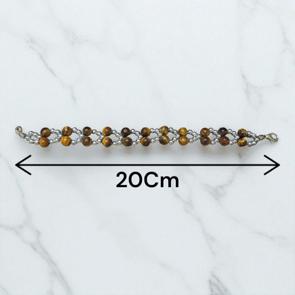 Tiger Eye Bracelet made of natural 7mm lab-certified beads with golden-brown tones placed on a white background
