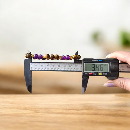 Tiger Eye and Amethyst Bracelet with 8mm polished beads on a white background, stretchable and lab certified