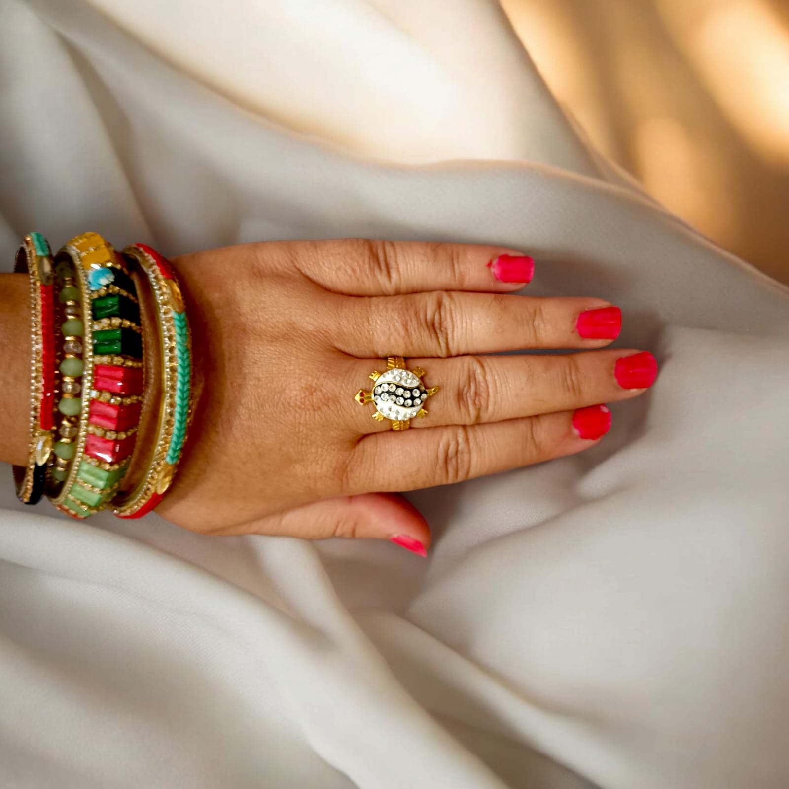 Tortoise Ring made of silver and brown with a stylish design and zircon diamond accents.