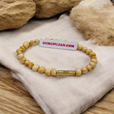 White Gunja Bracelet made from natural white Ratti beads with a secure screw lock design, Lab Certified for authenticity.