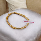 White Gunja Bracelet made from natural white Ratti beads with a secure screw lock design, Lab Certified for authenticity.