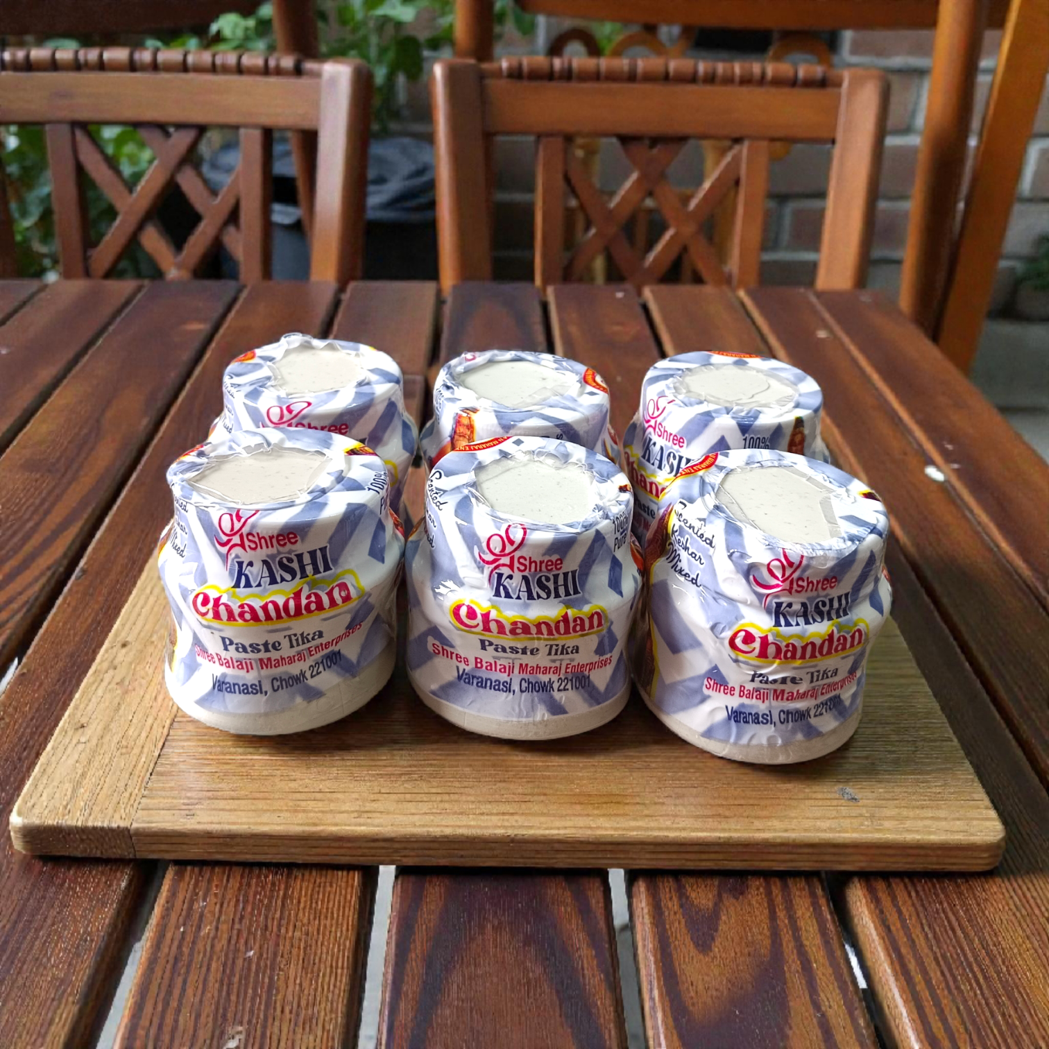 White chandan paste tika container used for tilak and religious rituals