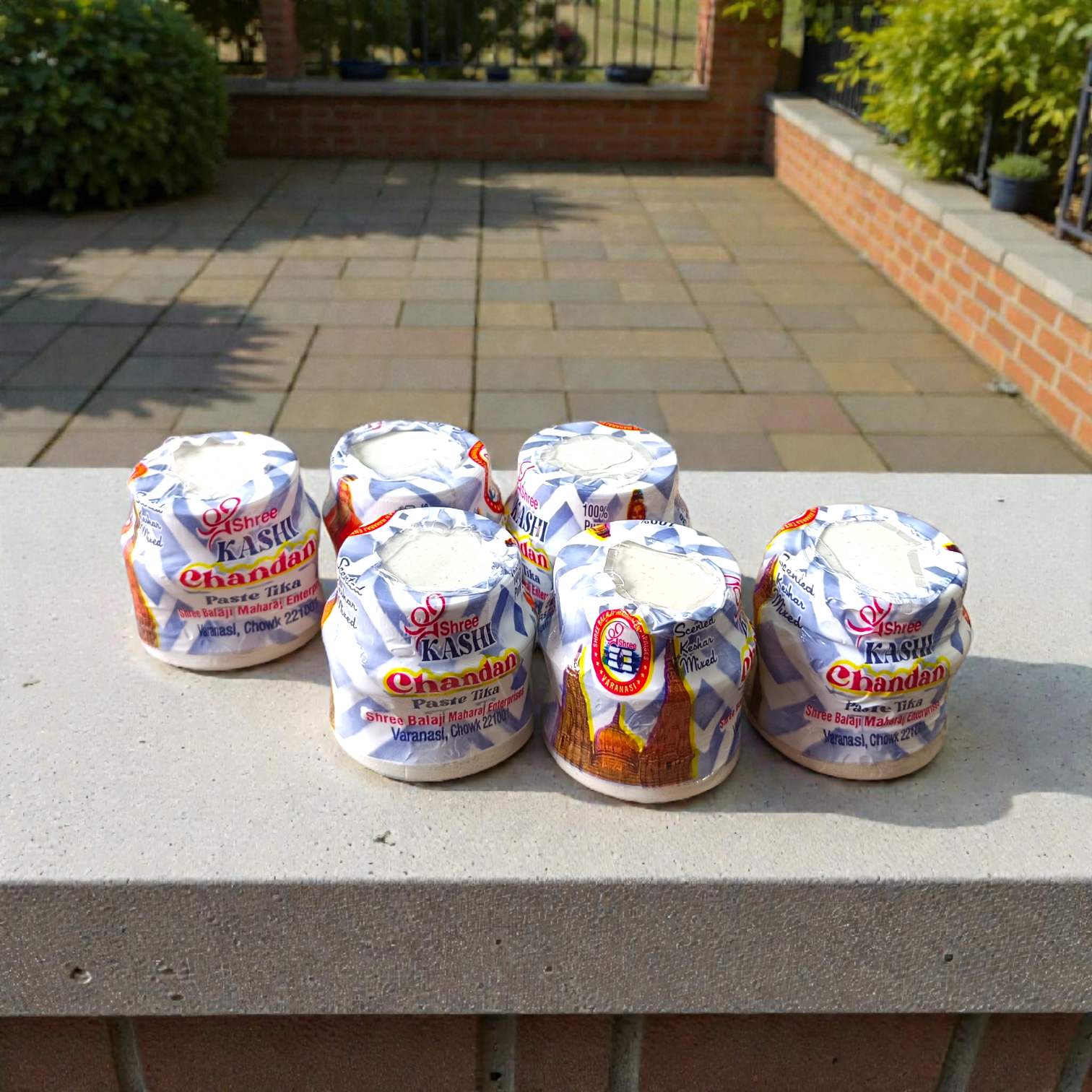White chandan paste tika container used for tilak and religious rituals