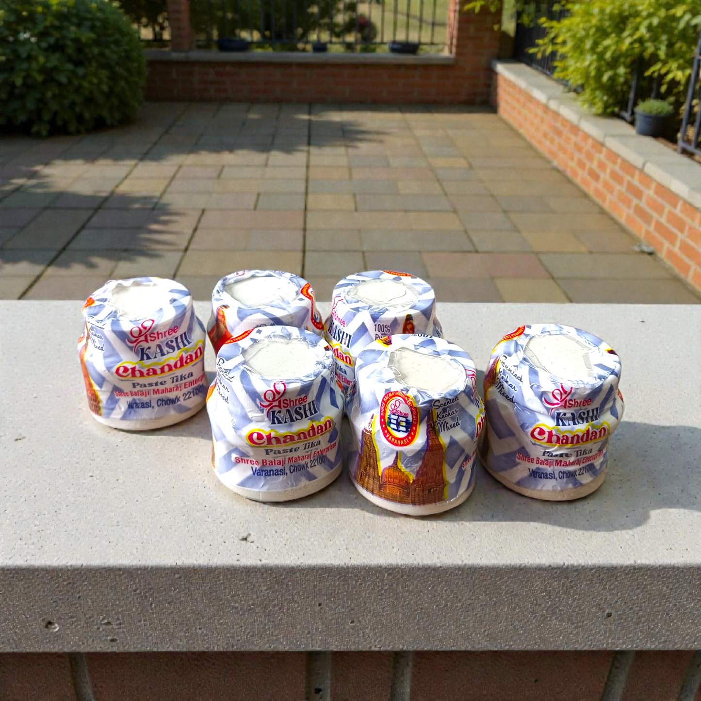 White chandan paste tika container used for tilak and religious rituals