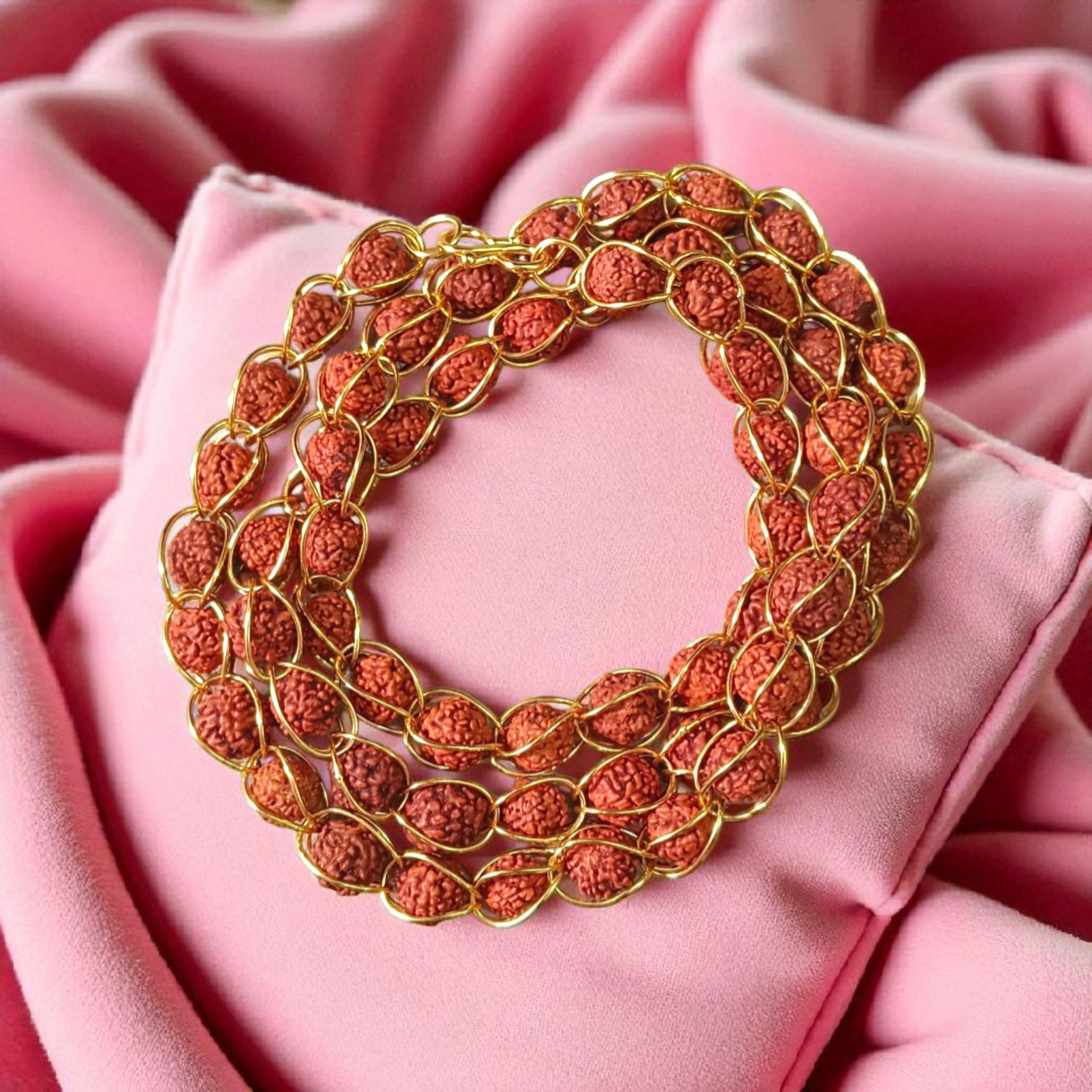 Wired Rudraksha Mala with 5mm beads studded in golden wire, lab certified for meditation and energy balance
