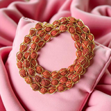 Wired Rudraksha Mala with 5mm beads studded in golden wire, lab certified for meditation and energy balance