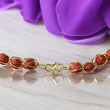 Wired Rudraksha Mala with 5mm beads studded in golden wire, lab certified for meditation and energy balance