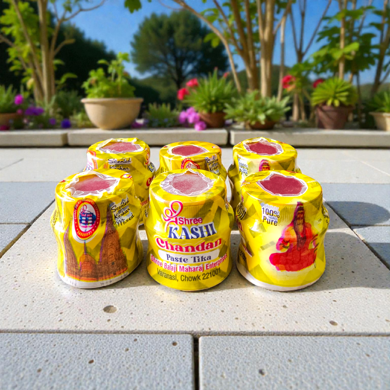 Yellow chandan paste tika container used for puja and tilak rituals