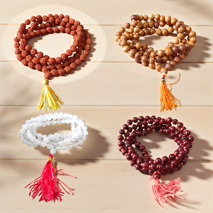 mage showing a Combo of 4 Jaap Malas (Rudraksha, Sphatik, Red &amp; White Chandan) placed neatly with 108+1 beads in each, ideal for meditation and chanting