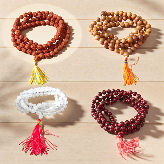 mage showing a Combo of 4 Jaap Malas (Rudraksha, Sphatik, Red &amp; White Chandan) placed neatly with 108+1 beads in each, ideal for meditation and chanting
