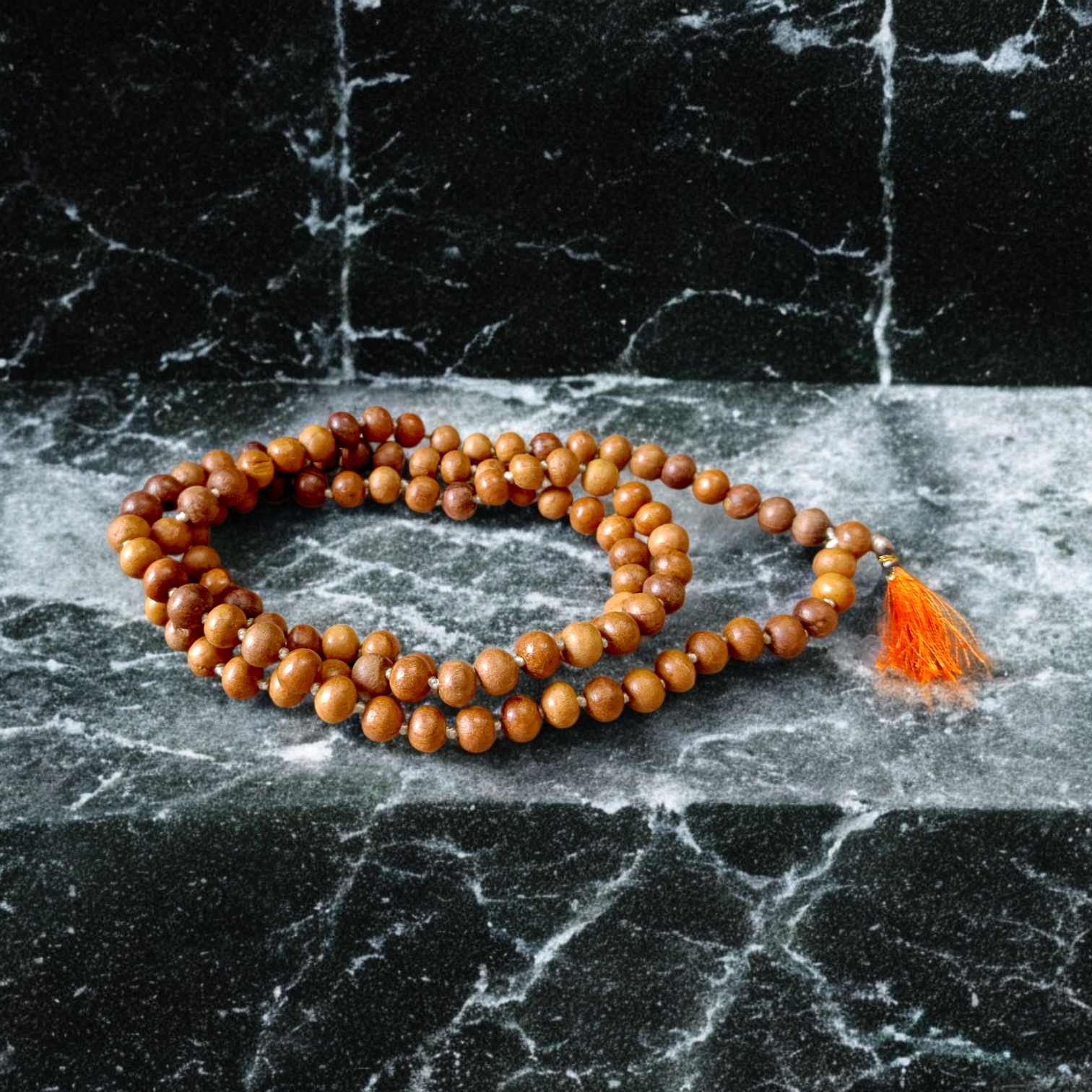 mage showing a Combo of 4 Jaap Malas (Rudraksha, Sphatik, Red &amp; White Chandan) placed neatly with 108+1 beads in each, ideal for meditation and chanting